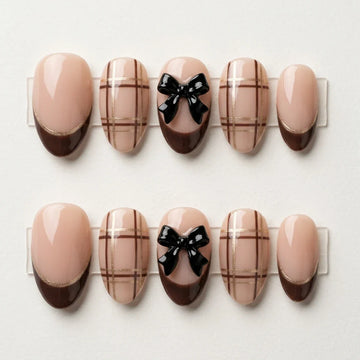 Nude brown black 3D French tip almond press-on nails with checkered ribbon bow detail