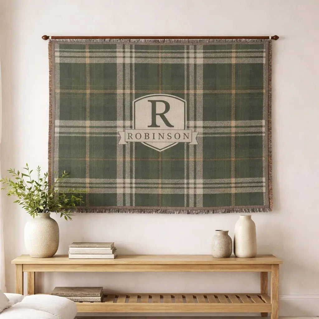 Personalized plaid blanket with custom family name in a styled room