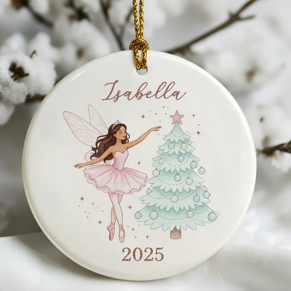Decorative ornament with fairy and Christmas tree design, featuring the name 'Isabella' and the year '2025'.