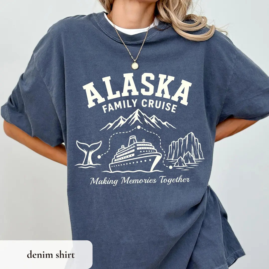 Woman in a Denim Comfort Colors tee and a white undershirt, hand on hip, white Alaska Family Cruise with whale tail and ship
