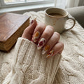 amber hand painted almond medium press on nails dark red blossom lifestyle 02