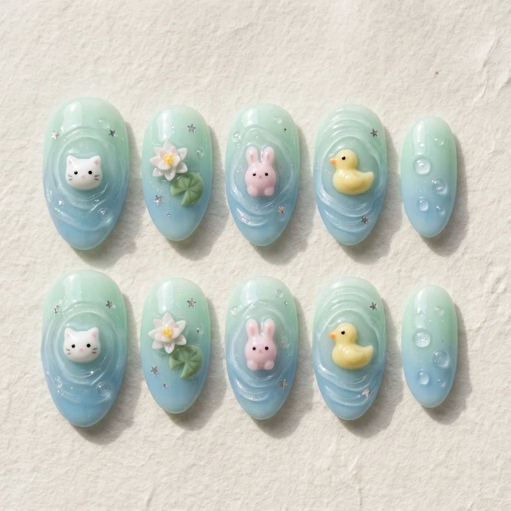 baby blue mint green 3d almond press on nails pond bunny duck cat lotus flat lay 04