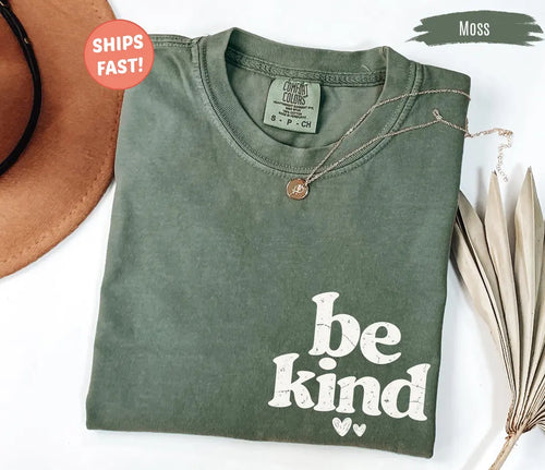 Be Kind graphic Comfort Colors T-shirt in Moss, main product photograph.