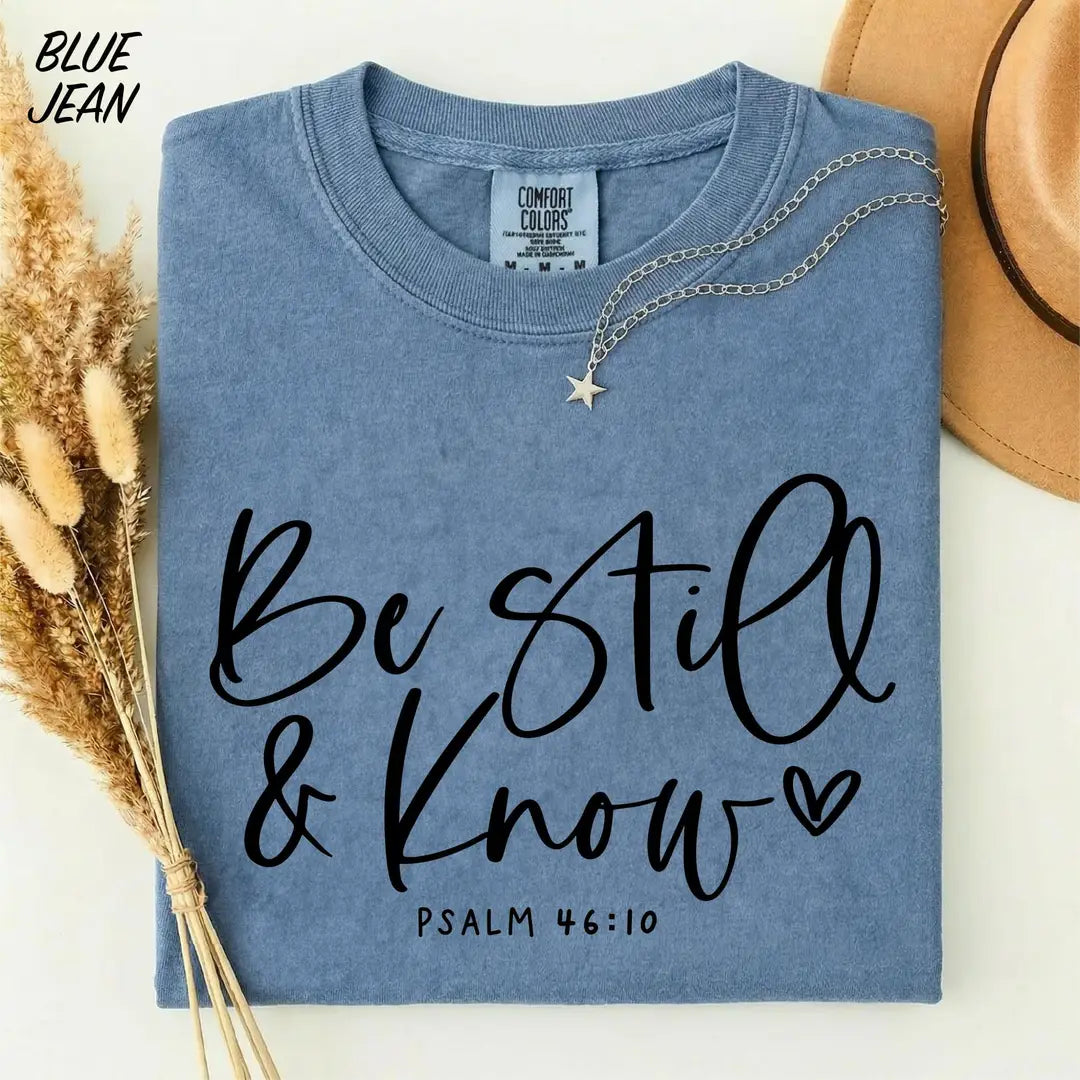 Blue Jean Comfort Colors 1717 T-shirt with Be Still & Know script and Psalm 46:10.