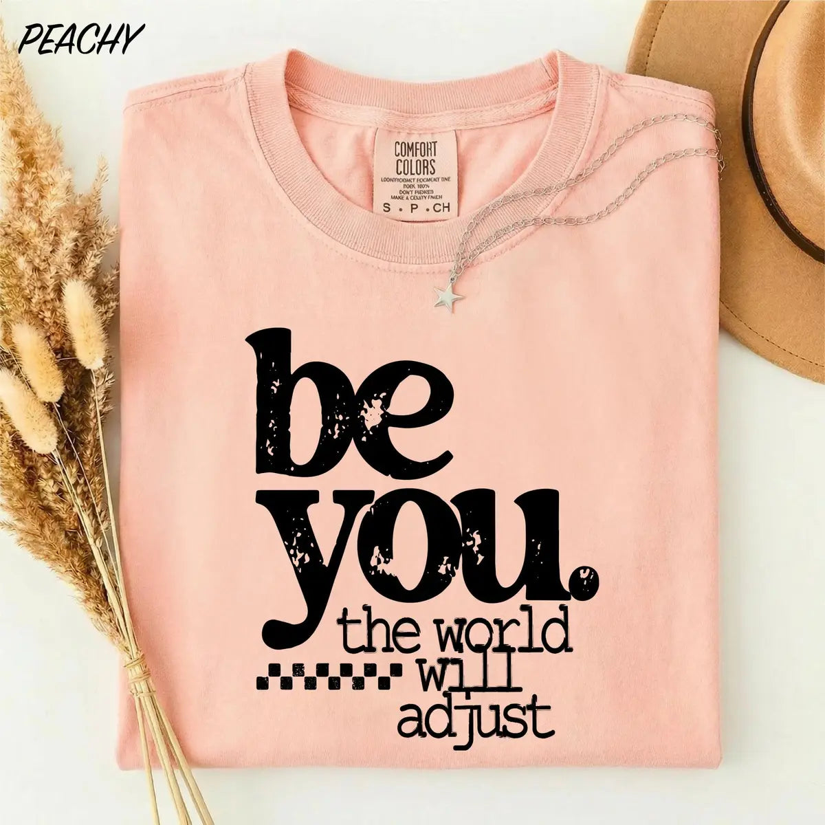 Be You The World Will Adjust graphic Comfort Colors T-shirt in Pink, main product photograph.