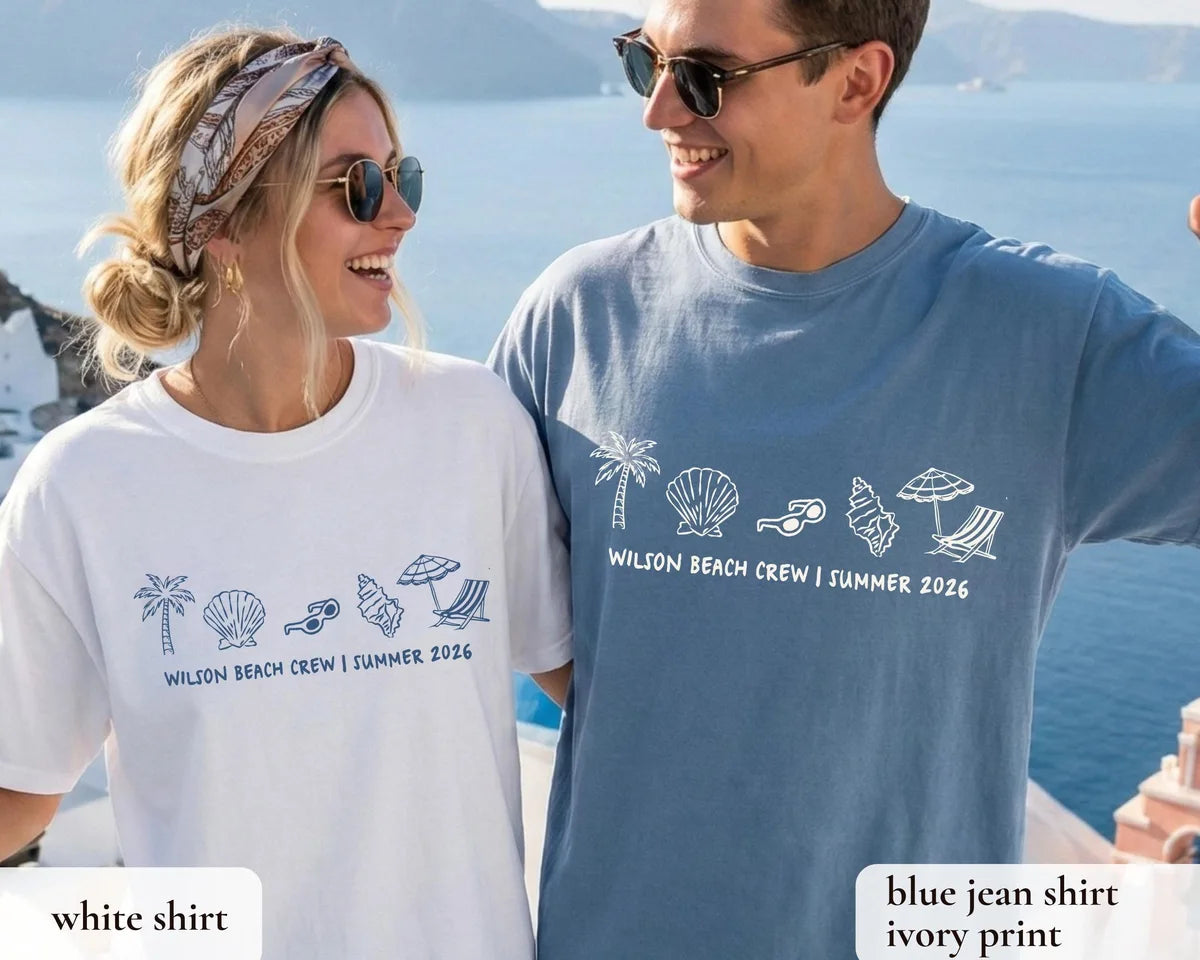 Close view of a couple in White and Blue Jean Comfort Colors tees, palm, shell and umbrella icons above Summer 2026