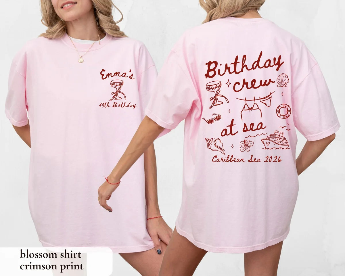 Woman in a Blossom pink Comfort Colors tee, front with a crimson goblet and Emma's, back with Birthday crew at sea
