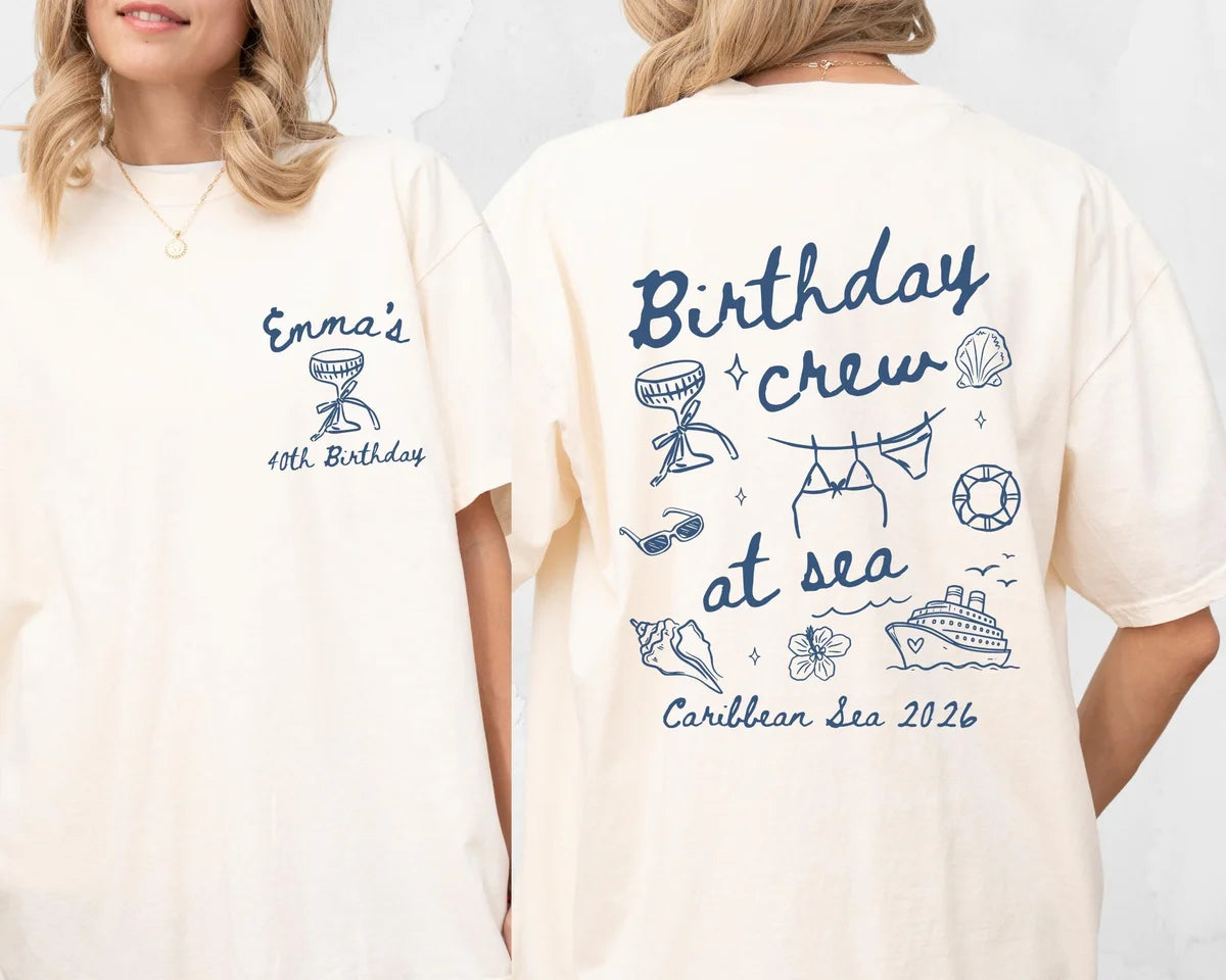 Two women in Ivory tees, front with a blue goblet and Emma's 40th Birthday, back with Birthday crew at sea