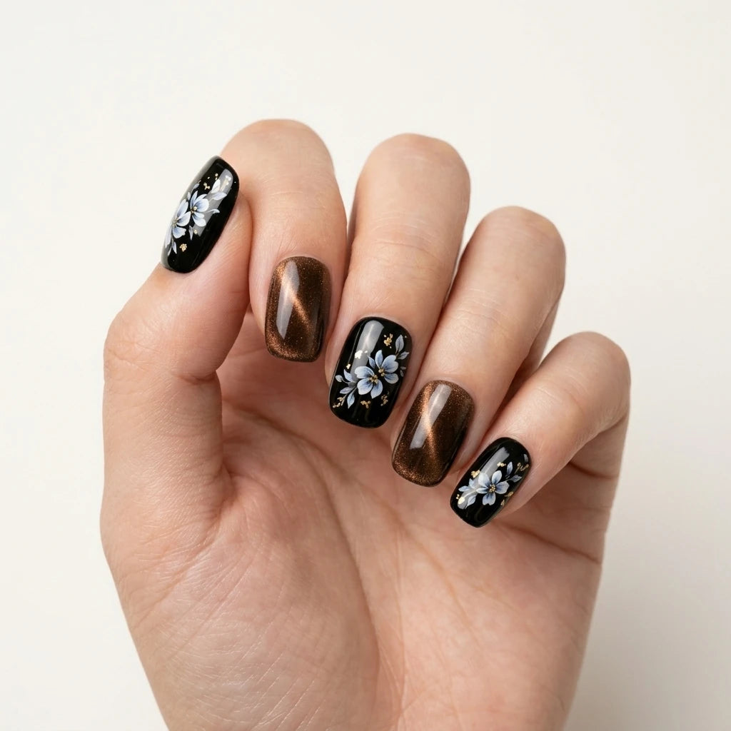 black bronze blue cat eye hand painted almond press on nails floral gold flake flat lay 03