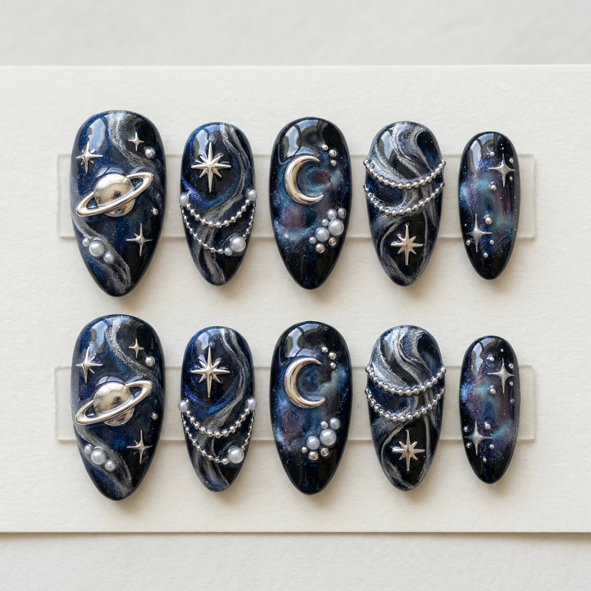 black hand painted almond medium press on nails silver planet saturn box 01