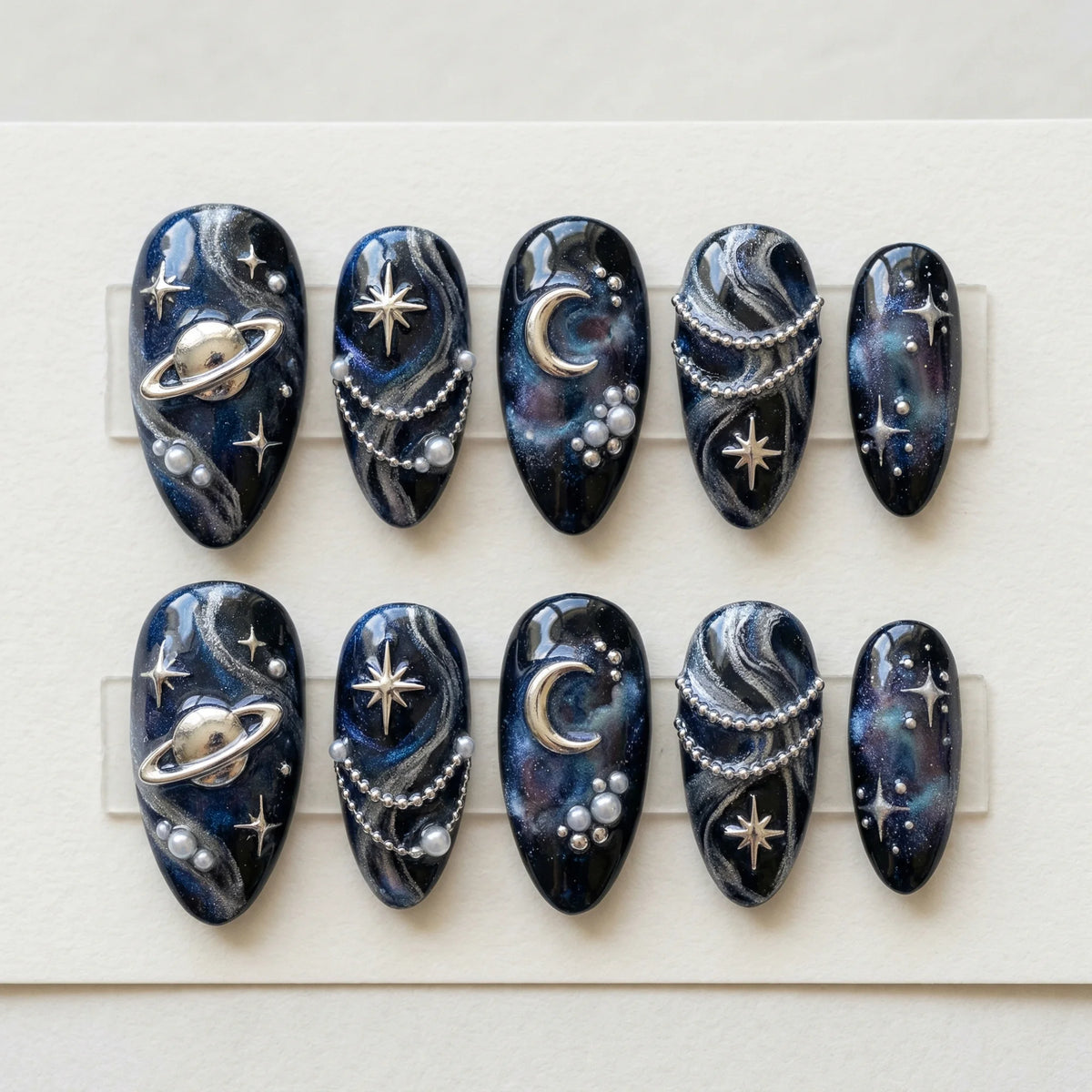 black hand painted almond medium press on nails silver planet saturn box 01