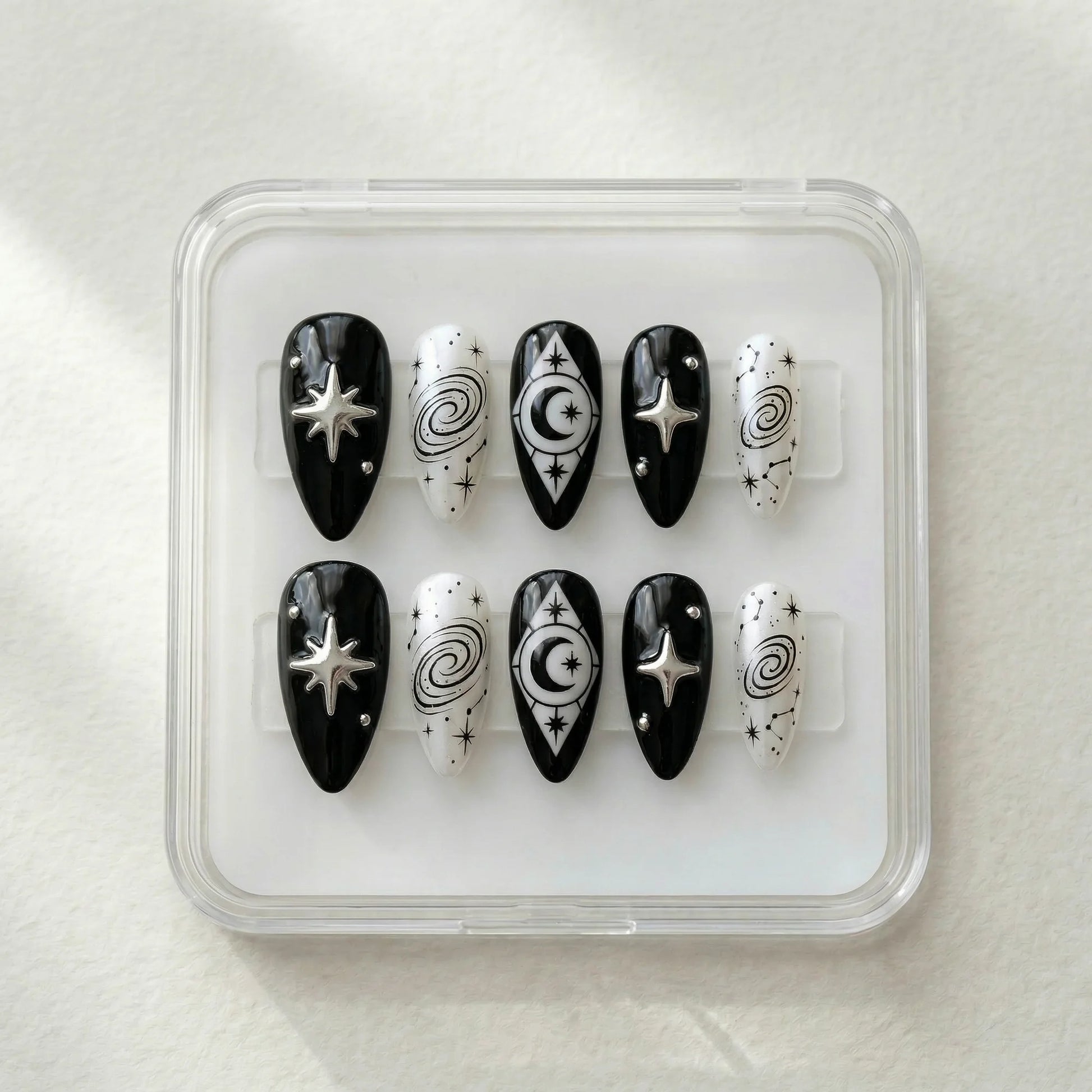 black hand painted stiletto medium press on nails spiral galaxy box 01