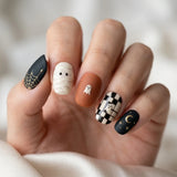 black white orange 3d hand painted halloween oval press on nails mummy spiderweb lifestyle 02