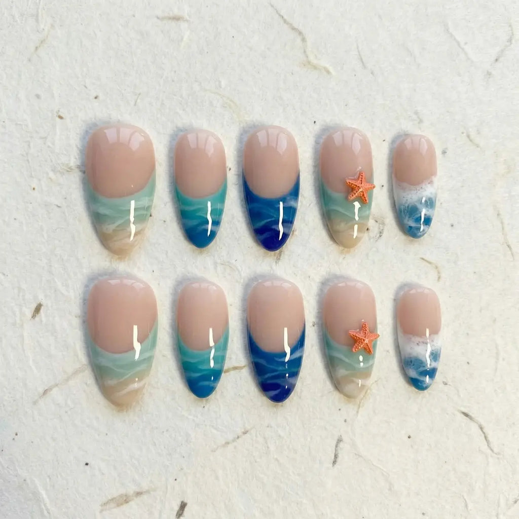 blue marble almond press on nails ocean wave 3d starfish flat lay 01