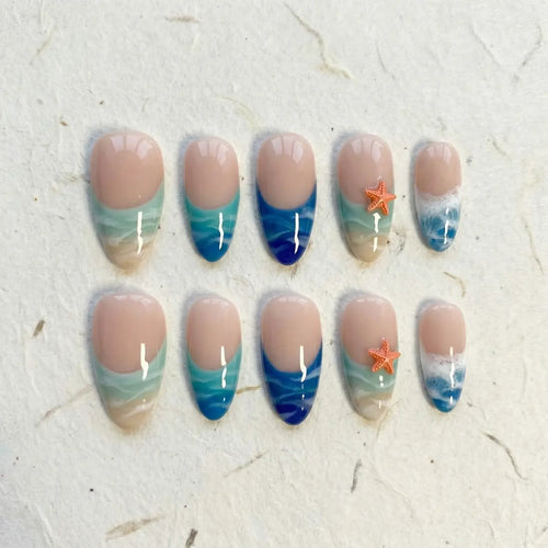 blue marble almond press on nails ocean wave 3d starfish flat lay 01