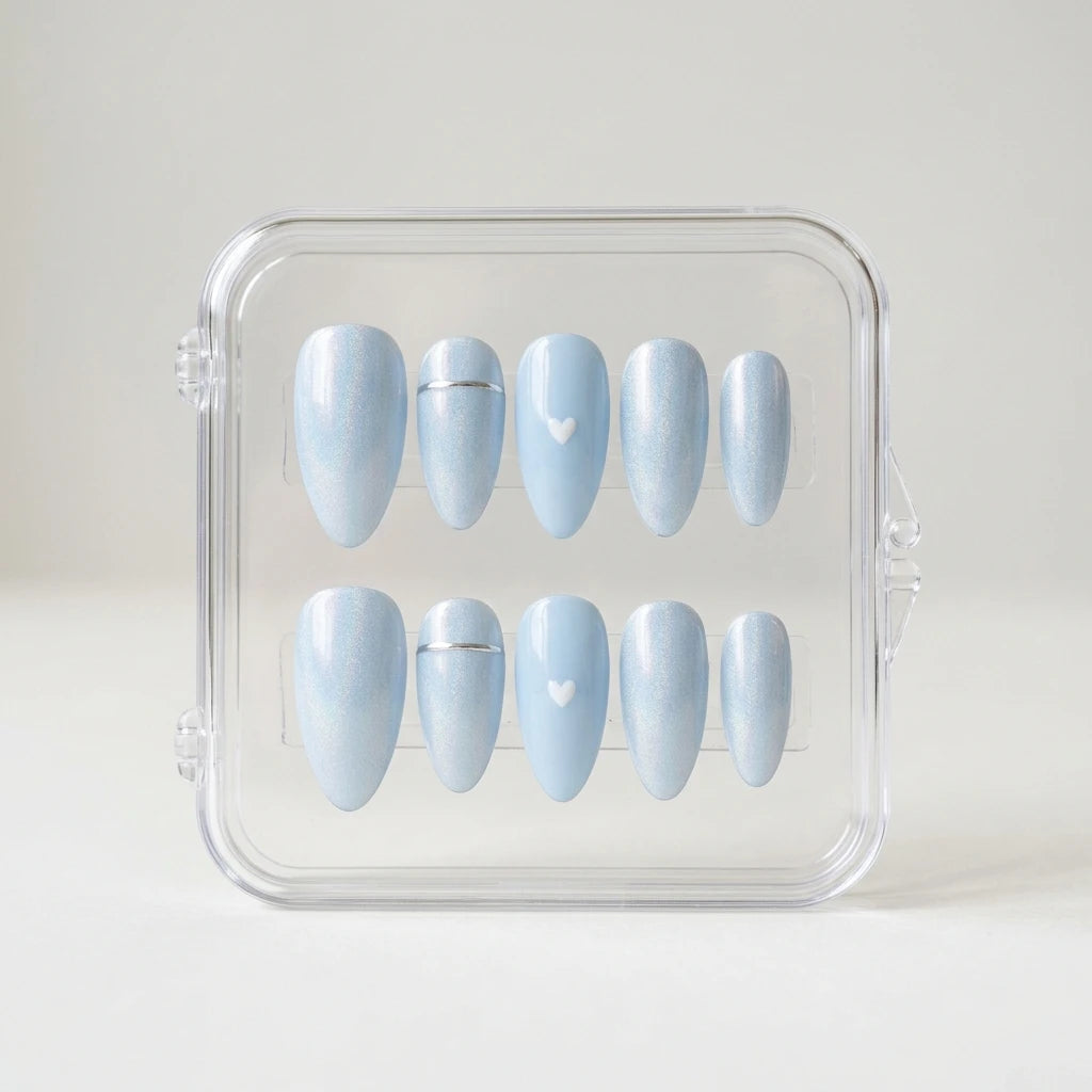 blue pearl almond press on nails white heart silver stripe flat lay 01
