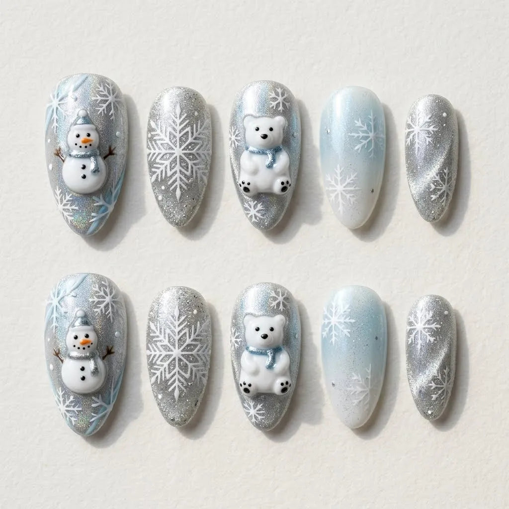 blue silver 3d ombre almond press on nails polar bear snowflake glitter flat lay 01