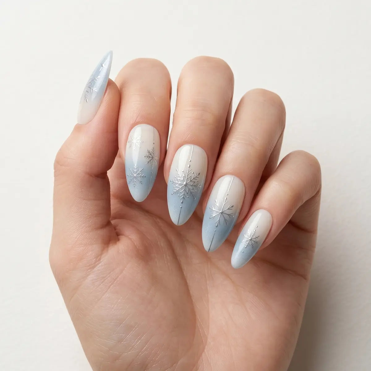 blue white ombre almond press on nails silver snowflake lifestyle 02