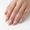 blush pink almond press on nails gold foil lifestyle 01