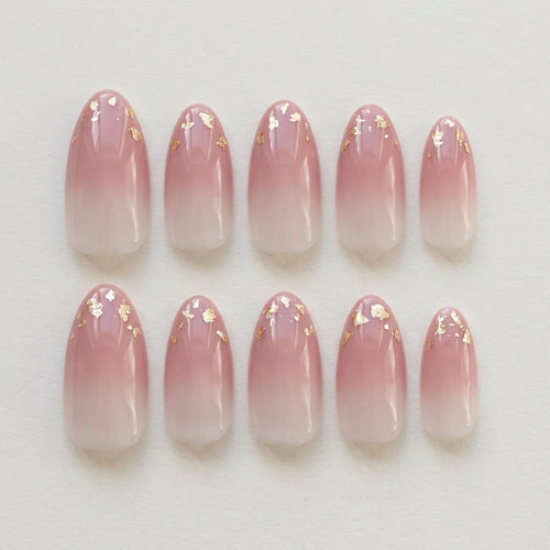 blush pink almond press on nails gold foil lifestyle 02
