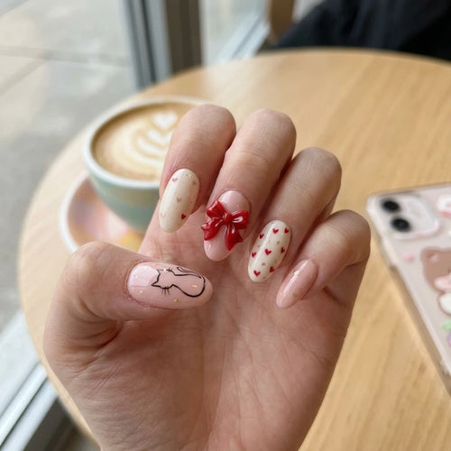 blush pink milky white 3d hand painted oval press on nails cat ribbon bow heart glitter lifestyle 02
