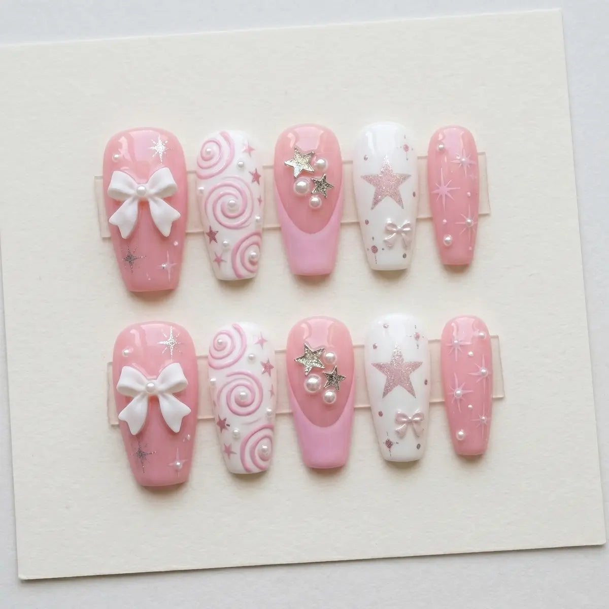 blush pink white 3d coffin long press on nails star ribbon bow flat lay 01