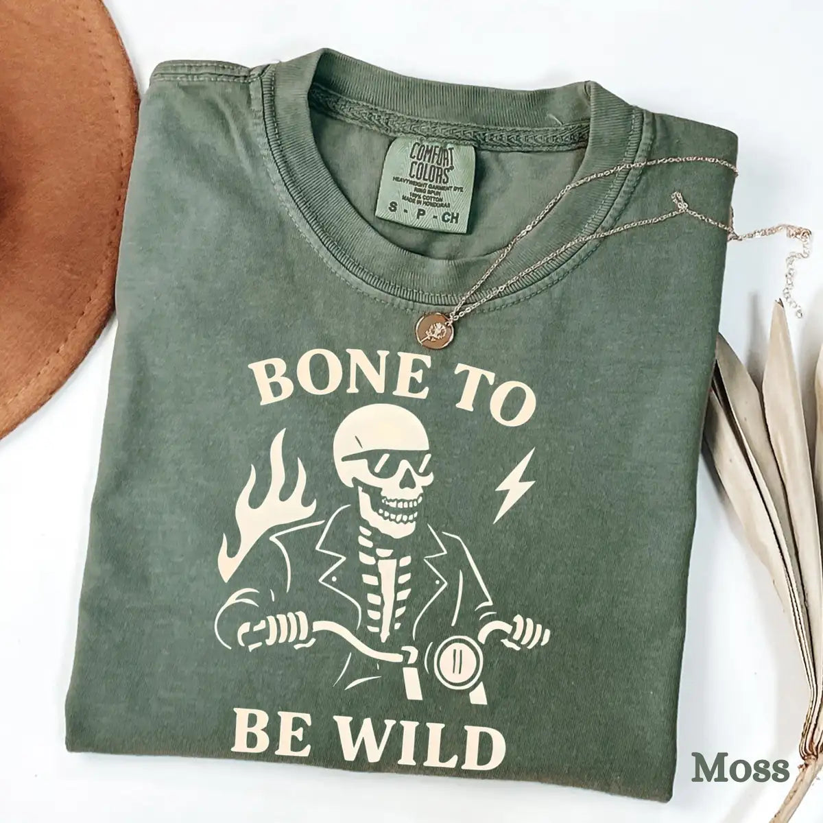 Comfort Colors T-shirt in Yam color featuring Bone To Be Wild skeleton riding motorcycle graphic