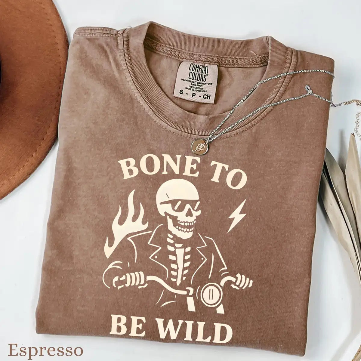 Comfort Colors T-shirt in Crunchberry color featuring Bone To Be Wild skeleton riding motorcycle graphic
