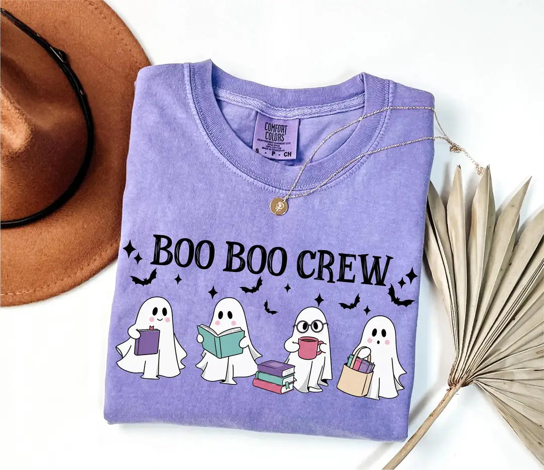 Bookish Halloween graphic Comfort Colors T-shirt in Black, main product photograph.