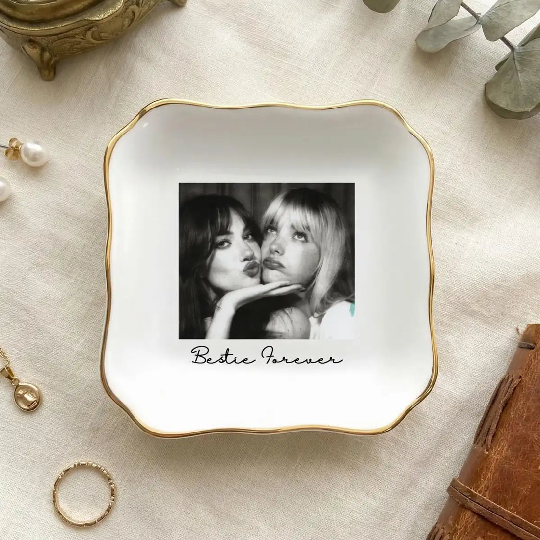 Custom photo bridesmaid ring dish displayed elegantly on wooden bedroom nightstand