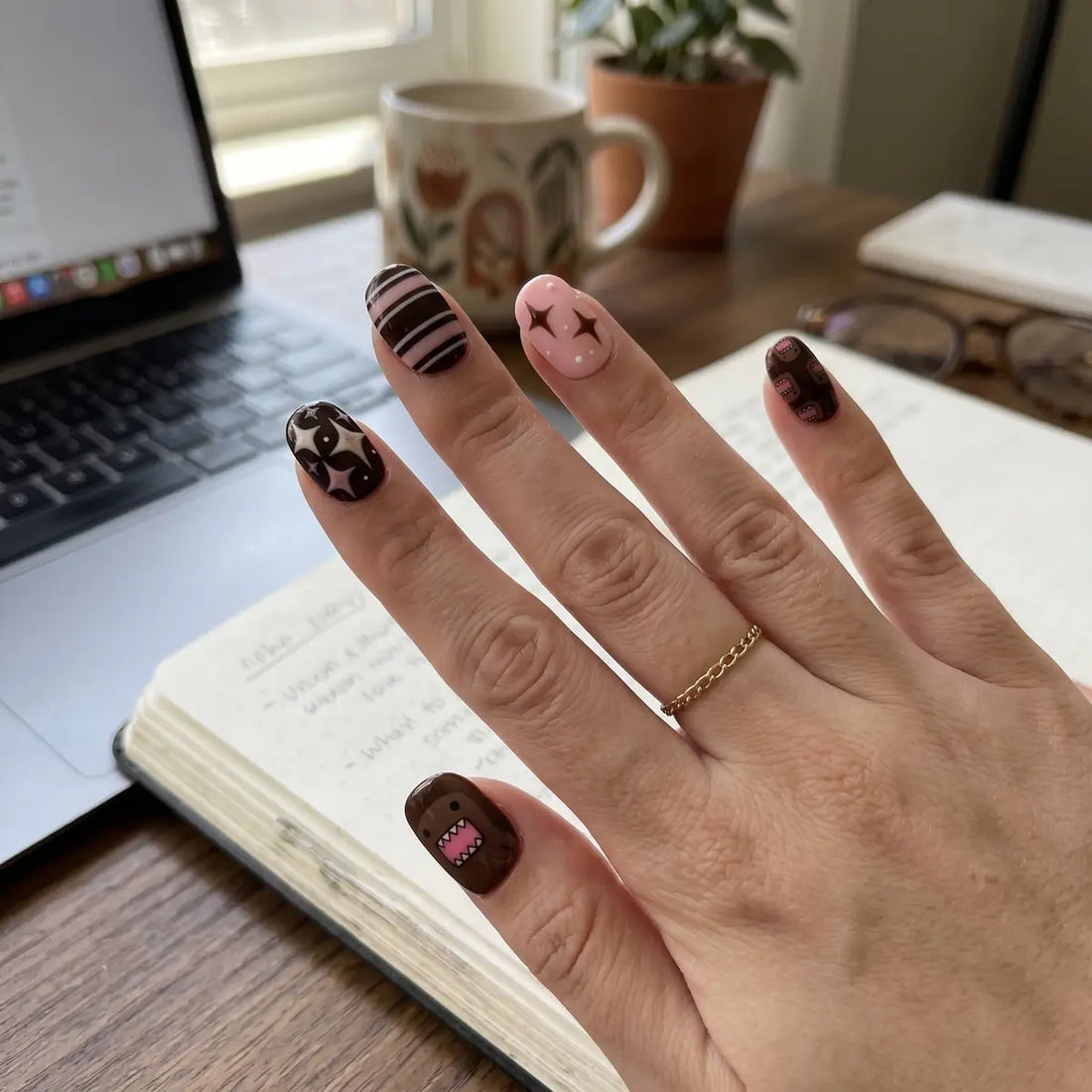 brown black pink hand painted oval short press on nails domo star stripe lifestyle 02