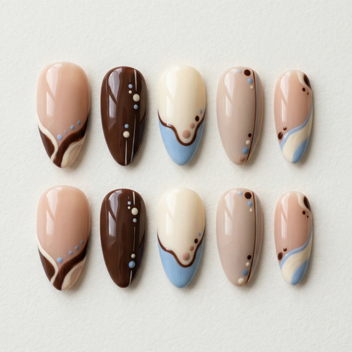brown hand painted almond medium press on nails abstract blue dot flat lay 01