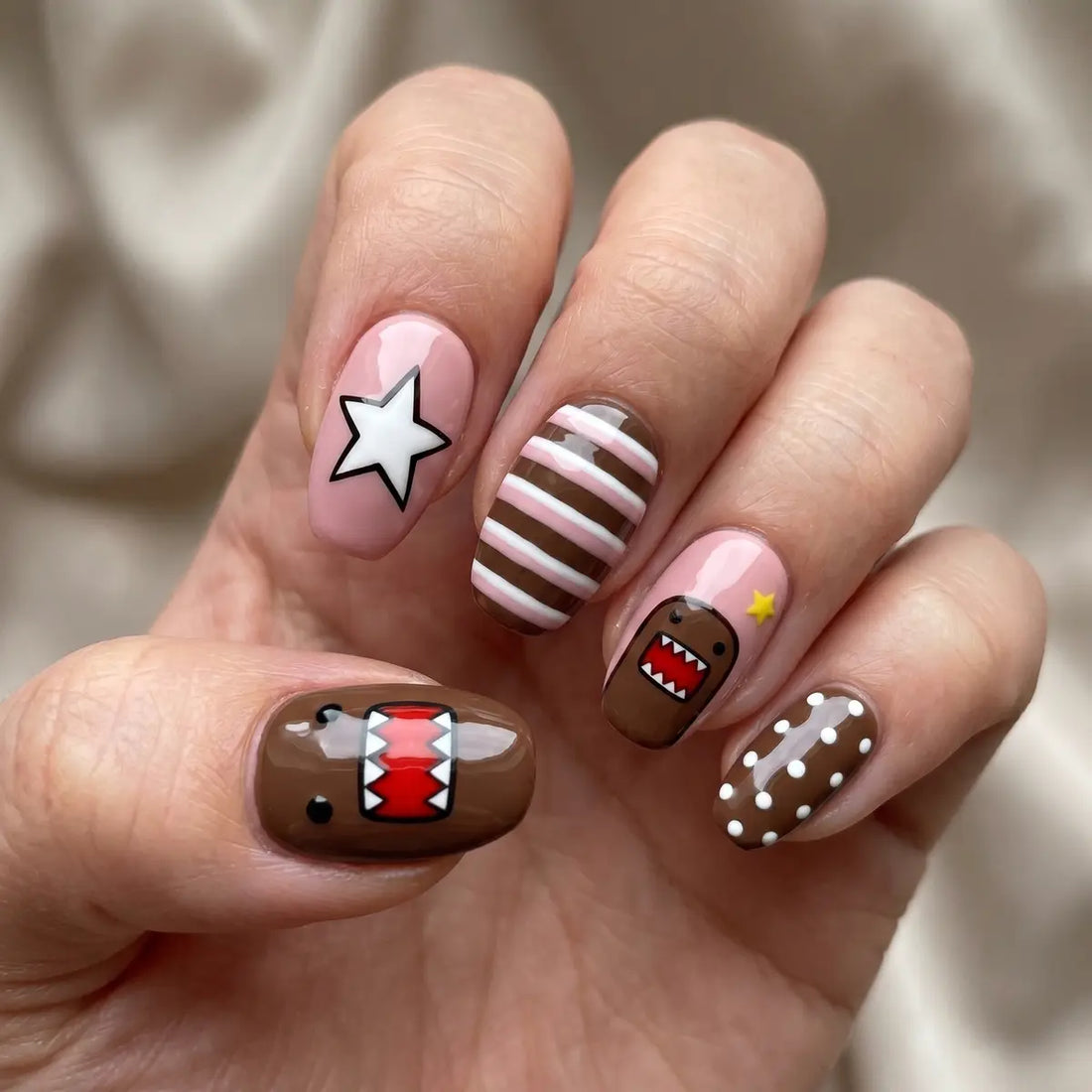 brown nude pink hand painted oval short press on nails domo star stripe polka dot lifestyle 02