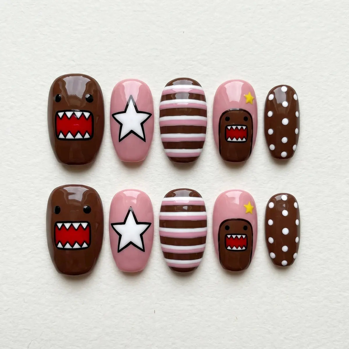 brown nude pink hand painted oval short press on nails domo star stripe polka dot mockup 01
