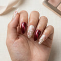 burgundy cat eye hand painted stiletto medium press on nails pink sakura lifestyle 02