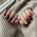burgundy french tip almond press on nails gold celestial sun star lifestyle 02