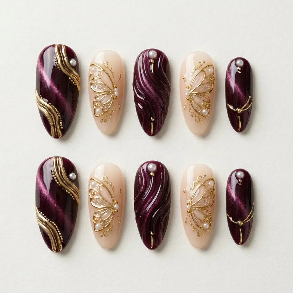 burgundy nude 3d cat eye almond press on nails butterfly pearl flat lay 01