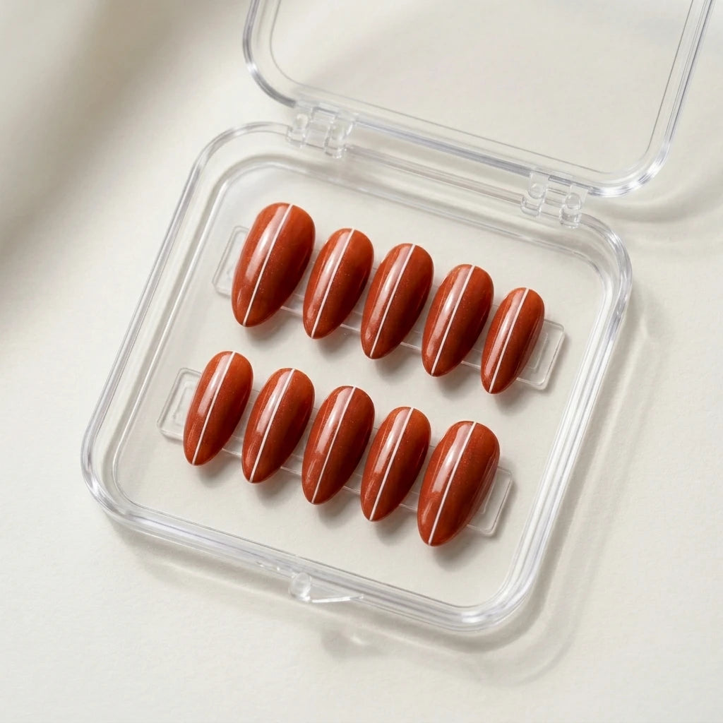 burnt orange almond press on nails white stripe detail 01
