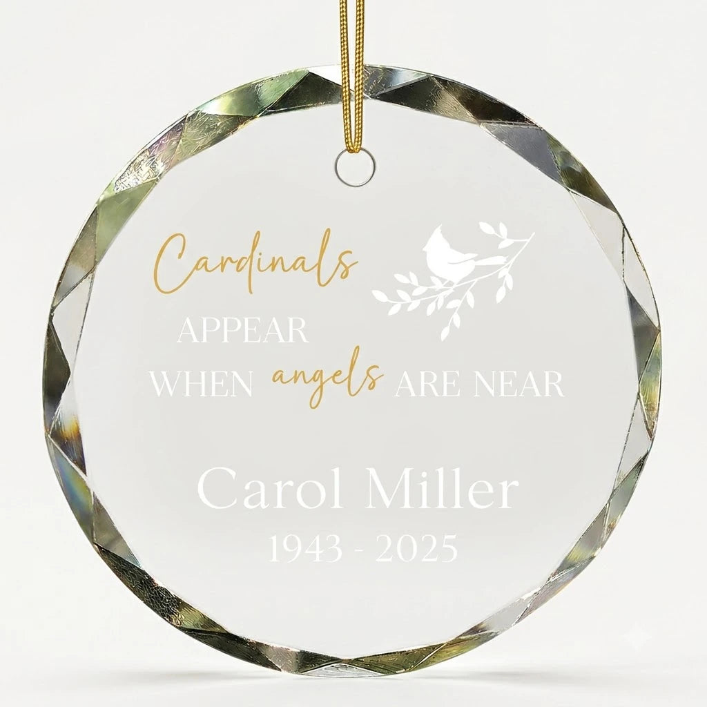 Beveled edge clear glass round ornament featuring printed cardinal bird on branch graphics, custom text Cardinals Appear When Angels Are Near and personalized details hanging on gold ribbon