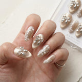 champagne cat eye hand painted almond medium press on nails coquette bow white lace lifestyle 04