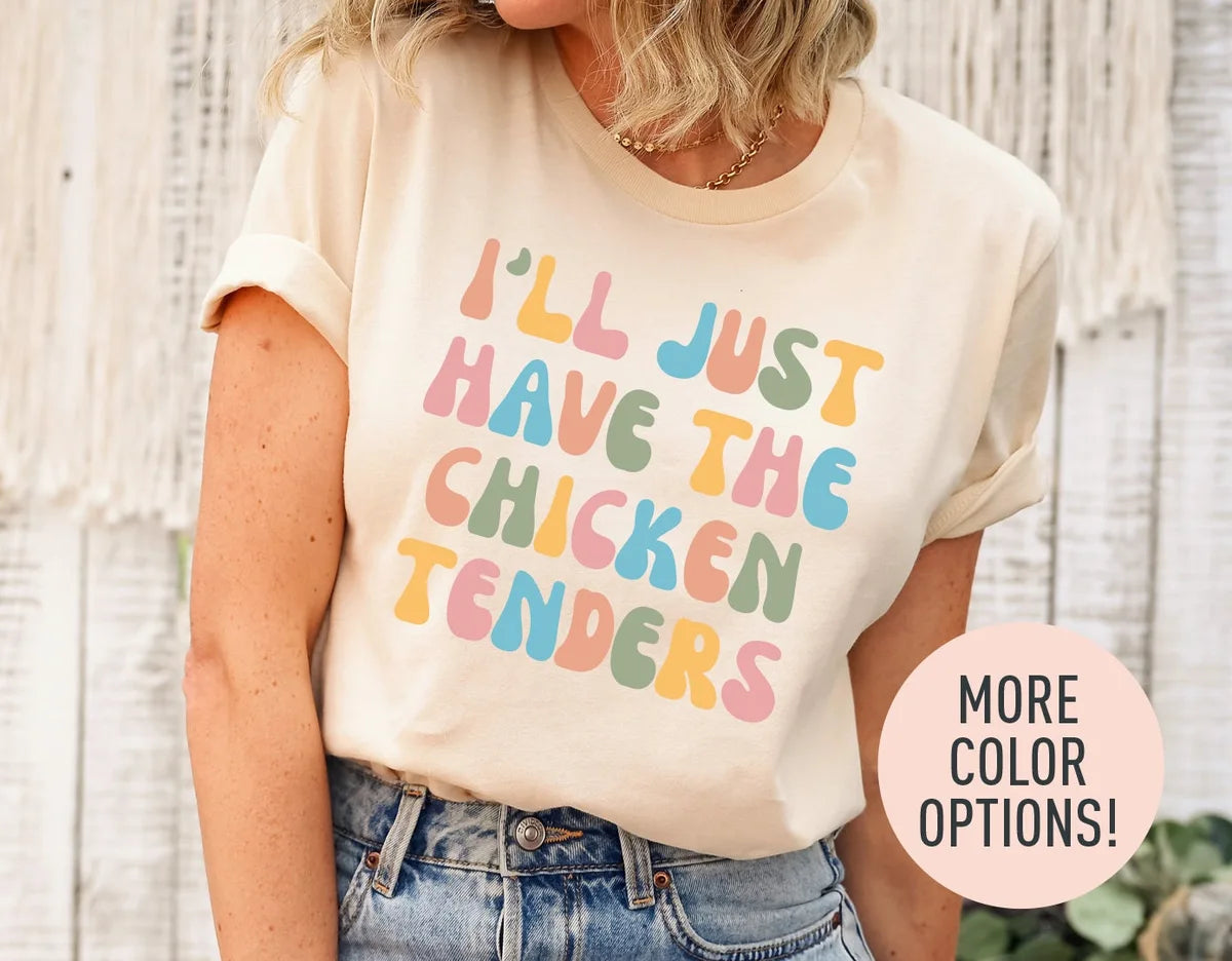 Woman in a natural cream tee with rolled sleeves and jeans, i'll just have the chicken tenders in pink, blue and sage bubbles