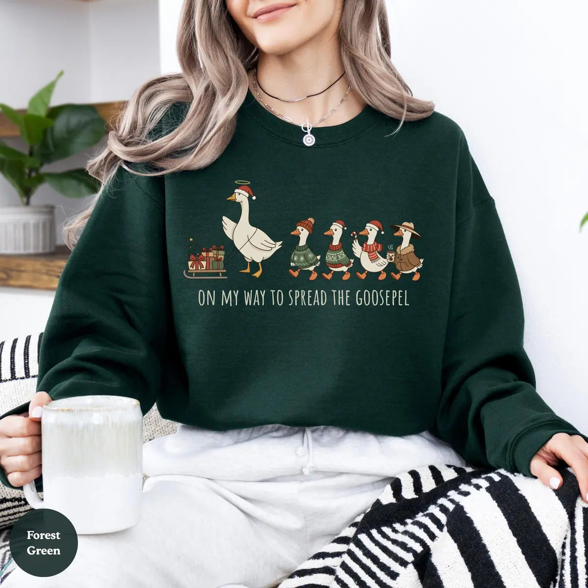 Christian Christmas Goose crewneck sweatshirt on a model in Forest Green.