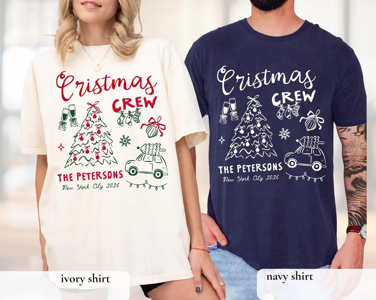 Woman and man in Ivory and True Navy Comfort Colors tees, crew script, tree, string lights and The Petersons