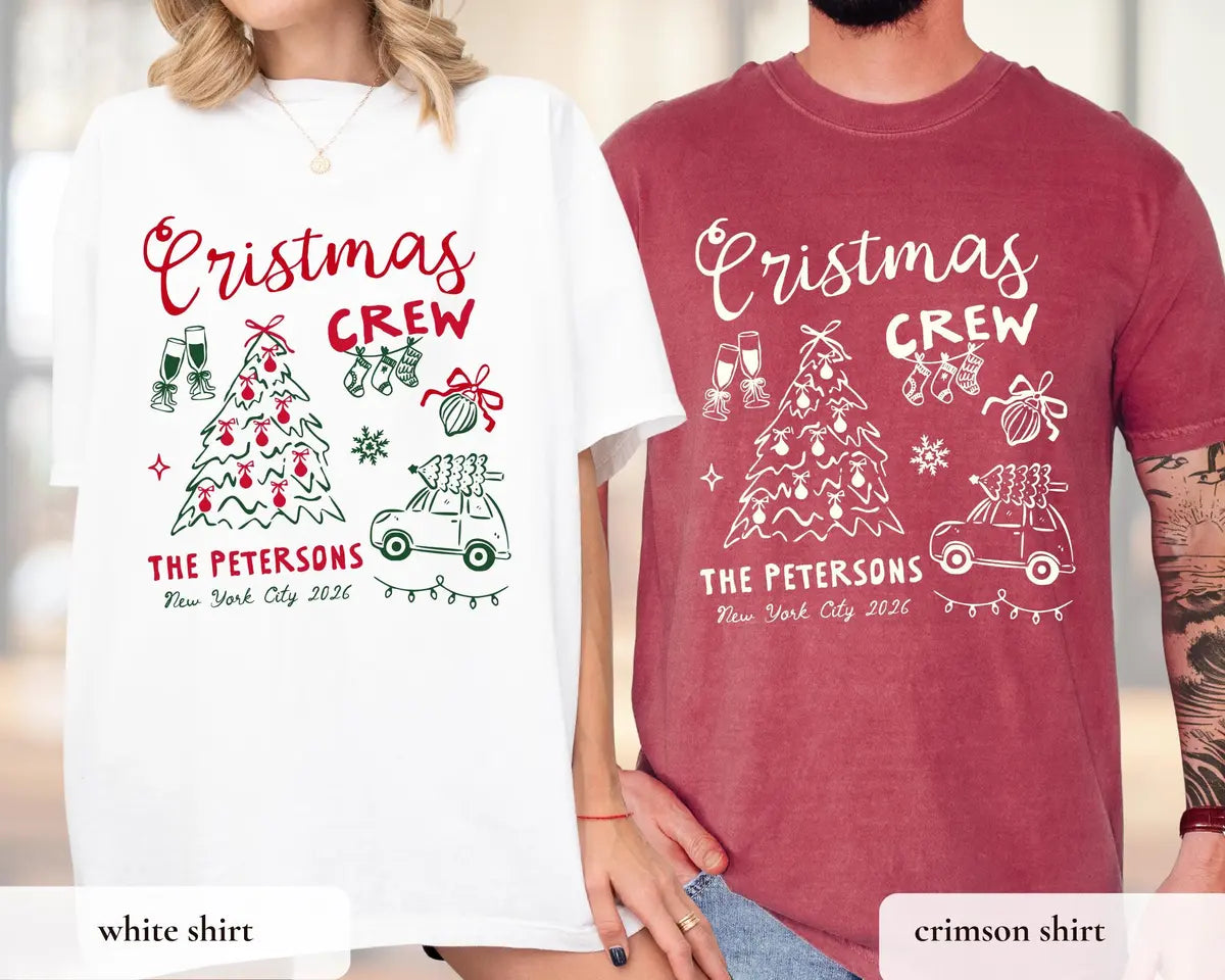 Woman in a White and man in a Crimson Comfort Colors tee, crew script, bow tree, champagne glasses and The Petersons