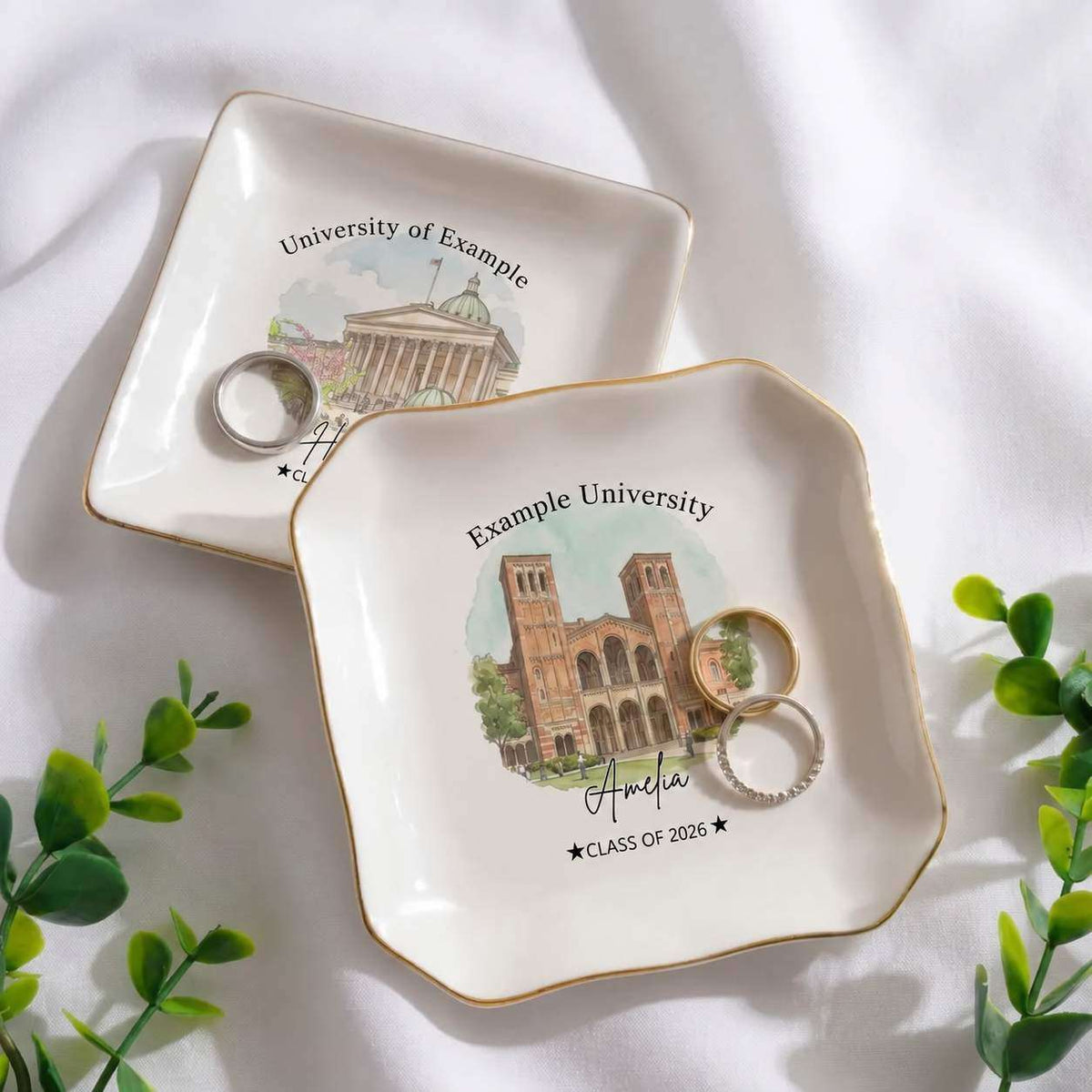 2 different ring dishes displayed on a white table. The one on the left is square and the one on the right is wavy-square