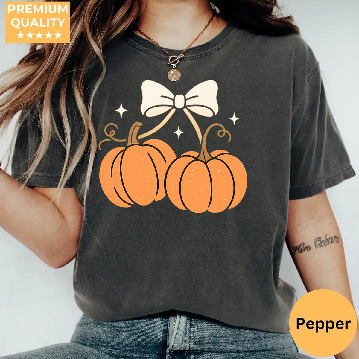 Comfort Colors T-shirt in Ivory color featuring pumpkins with bow graphic