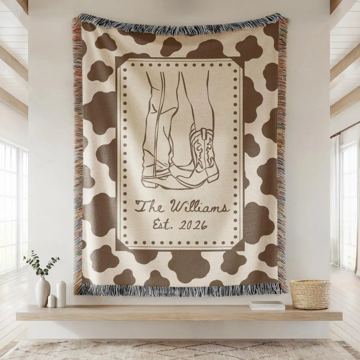 Close-up of the personalized cow print western woven blanket with texture and fringe detail