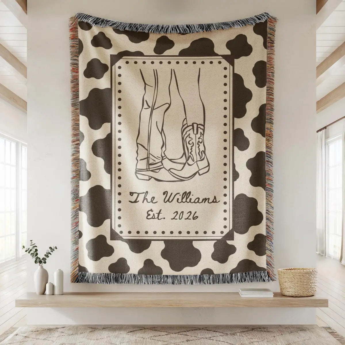 Close-up of the personalized cow print western woven blanket with texture and fringe detail