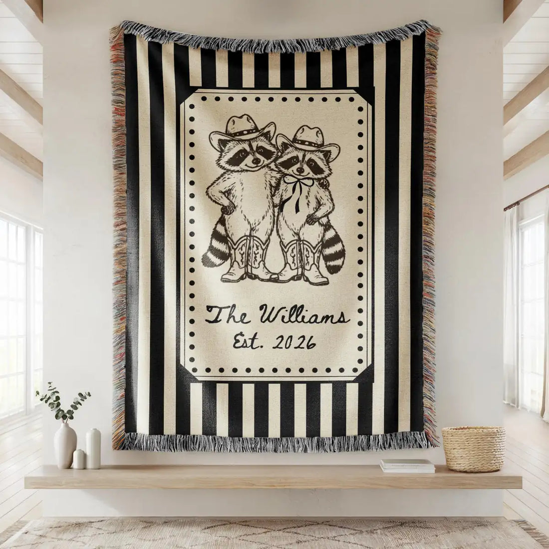Close-up of the personalized cowboy raccoon striped woven blanket with texture and fringe detail