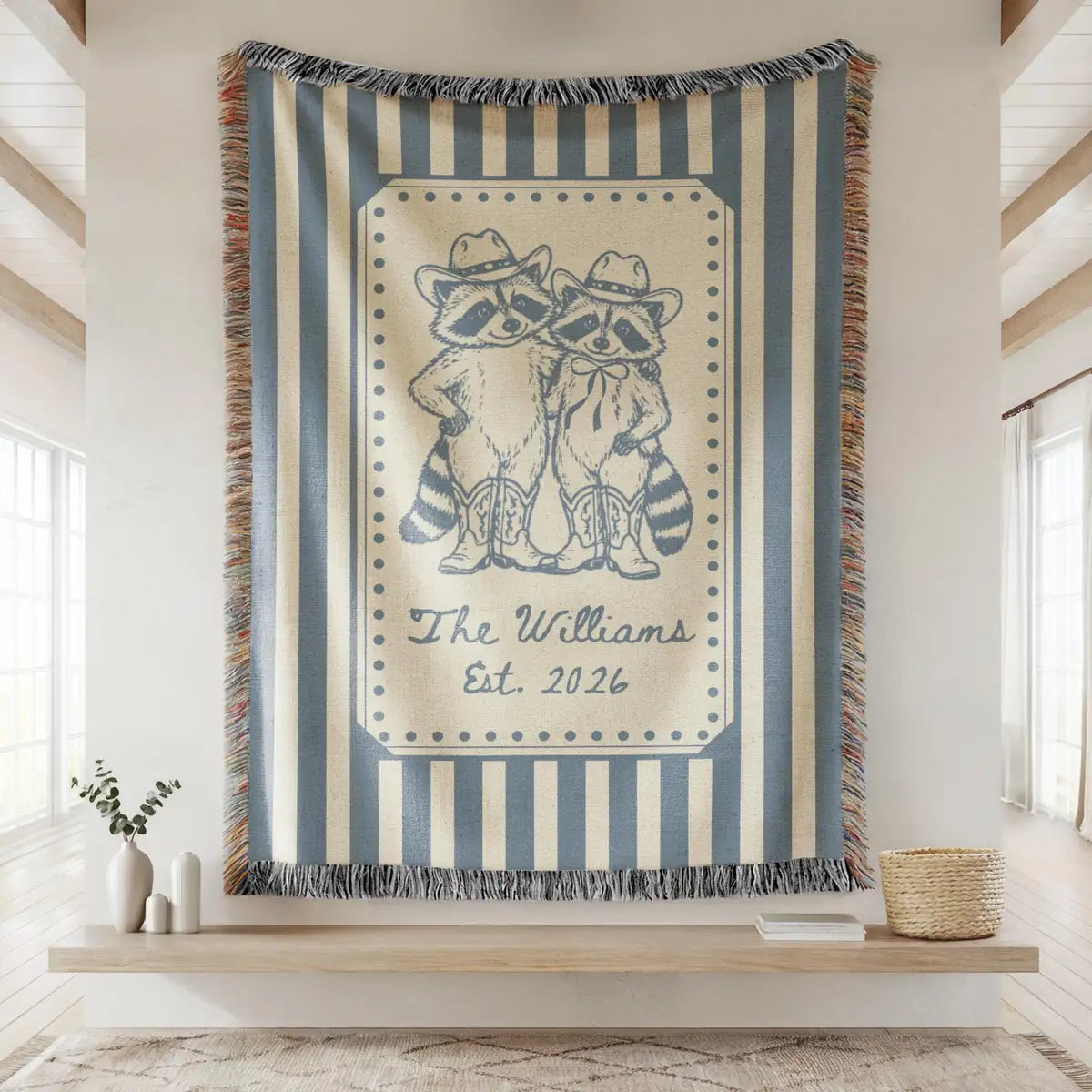 Close-up of the personalized cowboy raccoon striped woven blanket with texture and fringe detail